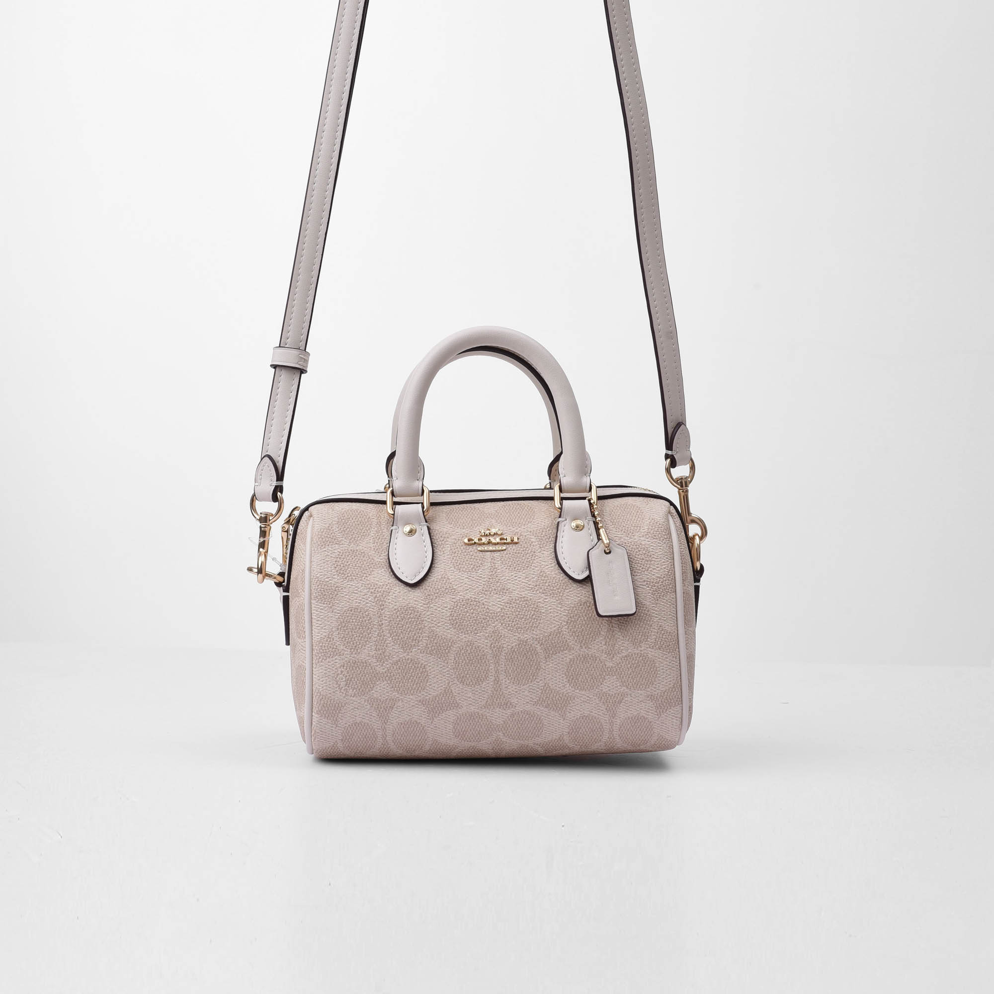 COACH SIGNATURE MINI ROWAN CROSS BAG - SAND/WHITE