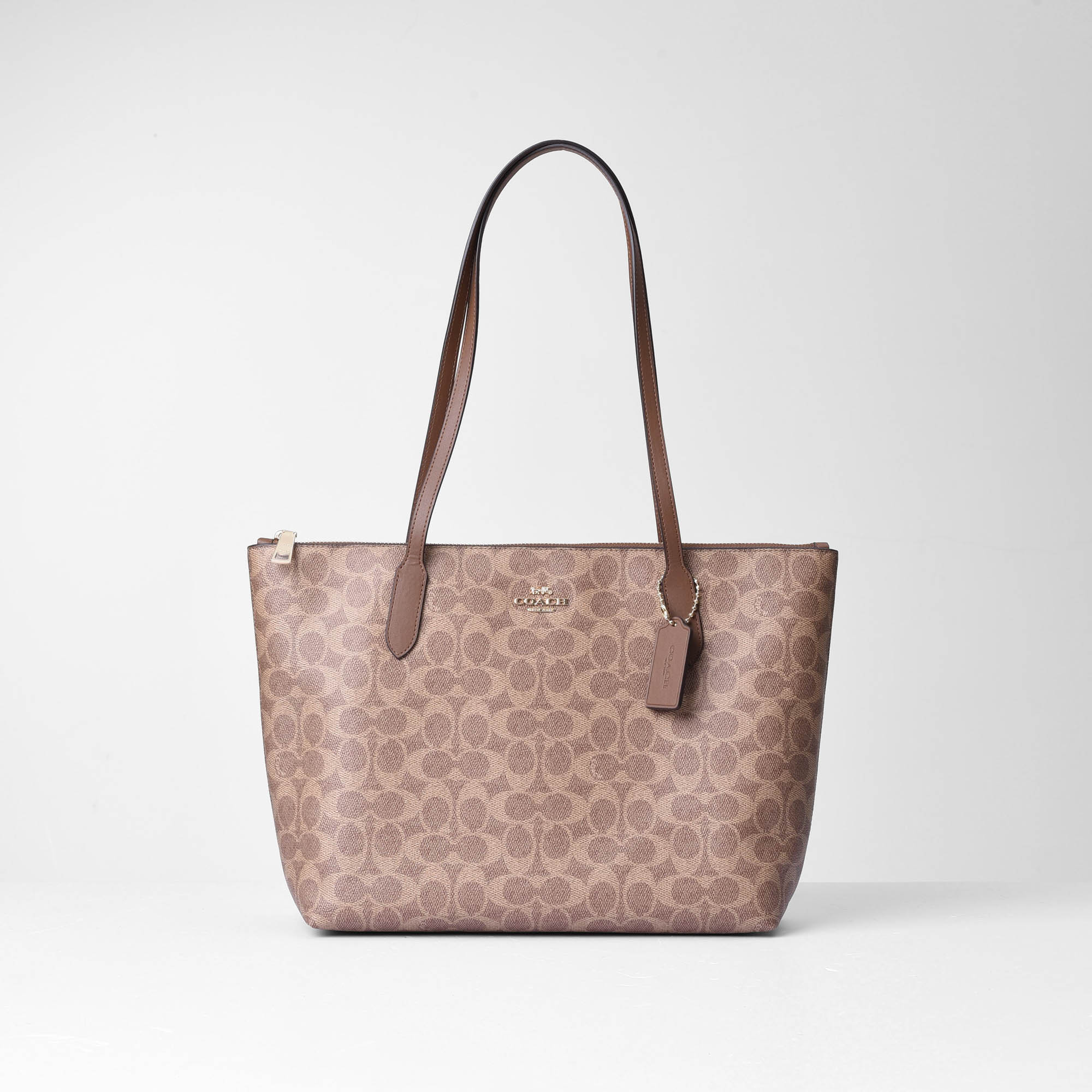 COACH SIGNATURE CANVAS ZIP TOTE BAG - BROWN