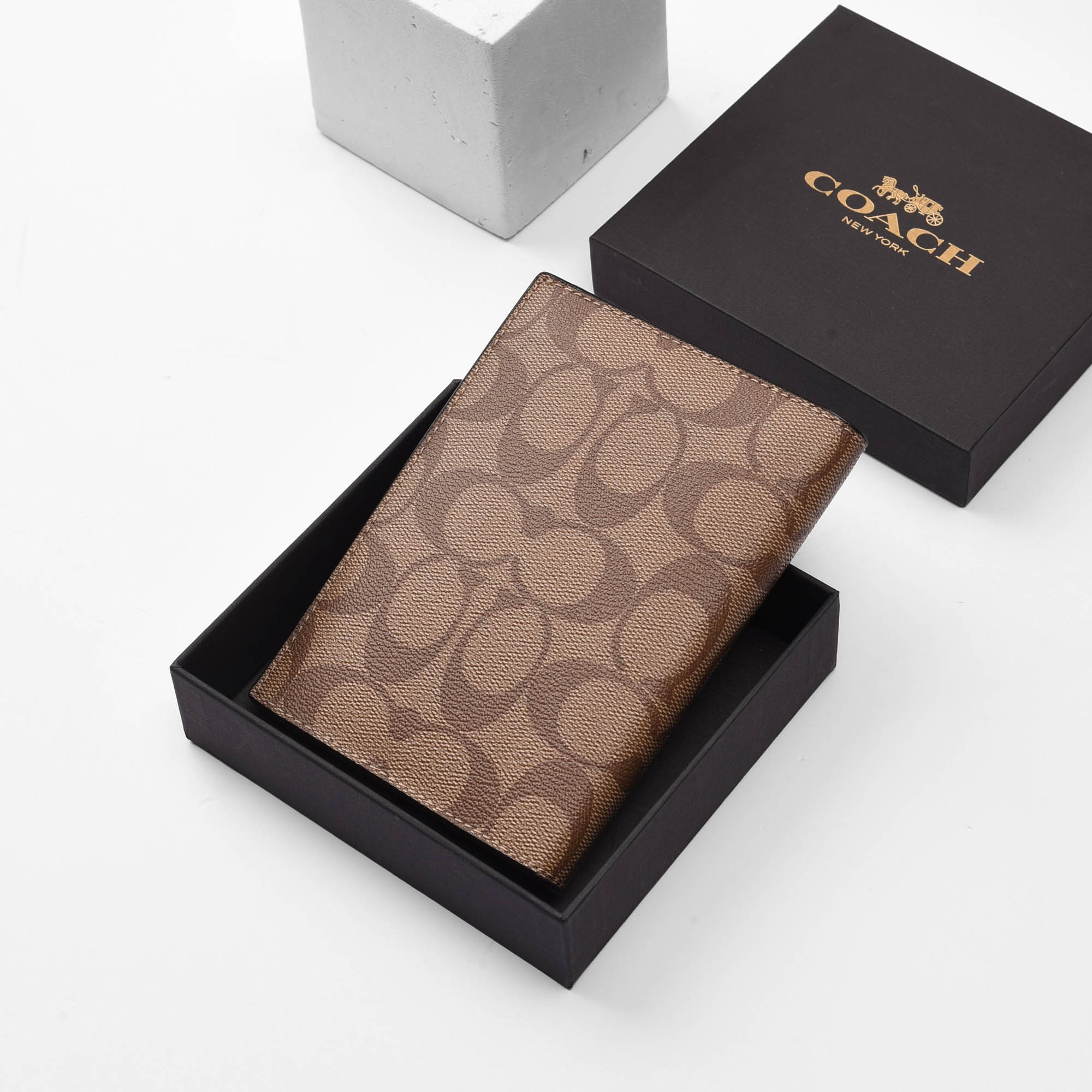 COACH REXY PASSPORT WALLET - BROWN