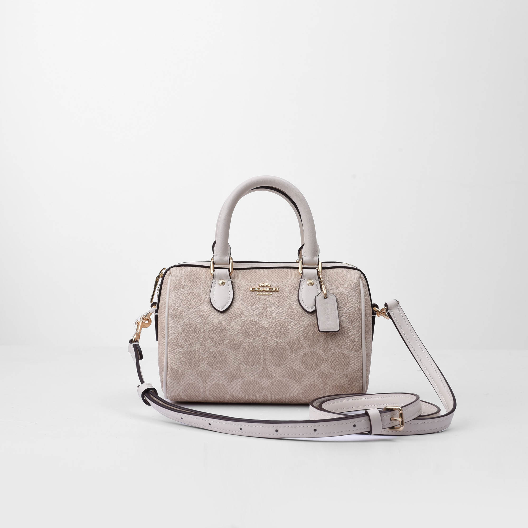COACH SIGNATURE MINI ROWAN CROSS BAG - SAND/WHITE